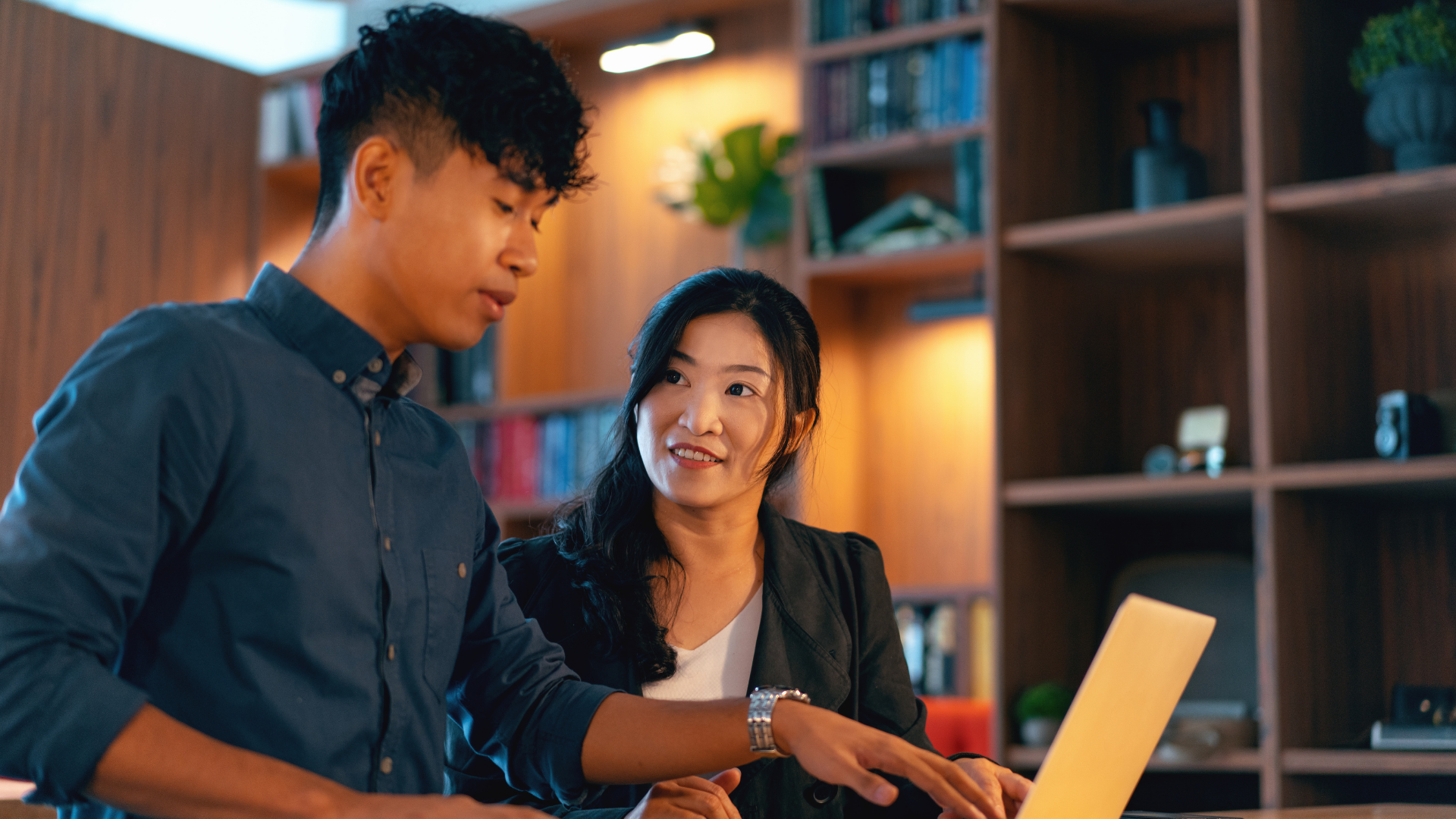 Interns working on computer