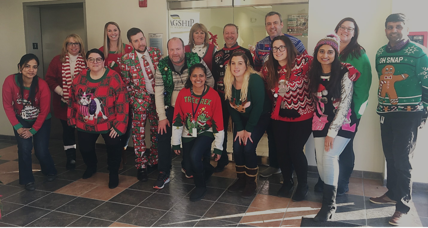 Associates in Flagship’s Chadds Ford, PA office participating in the Company’s annual Ugly Sweater Contest in 2019.